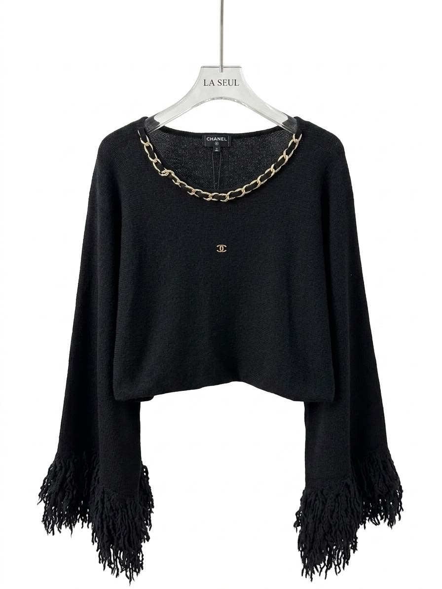 Chanel knit sweater Black with a gold chain neckline and fringed sleeves