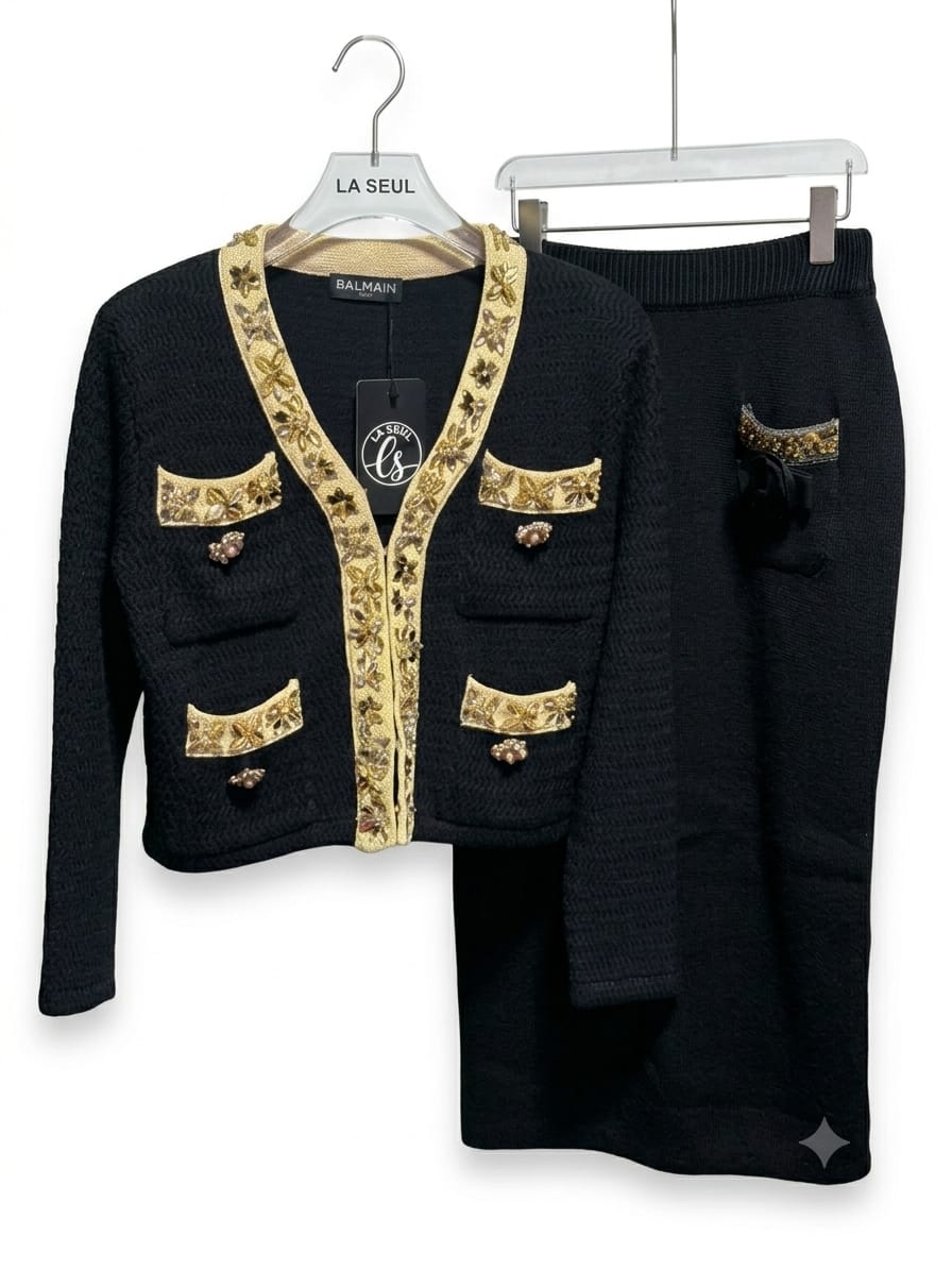 Black suit with a black skirt balmain